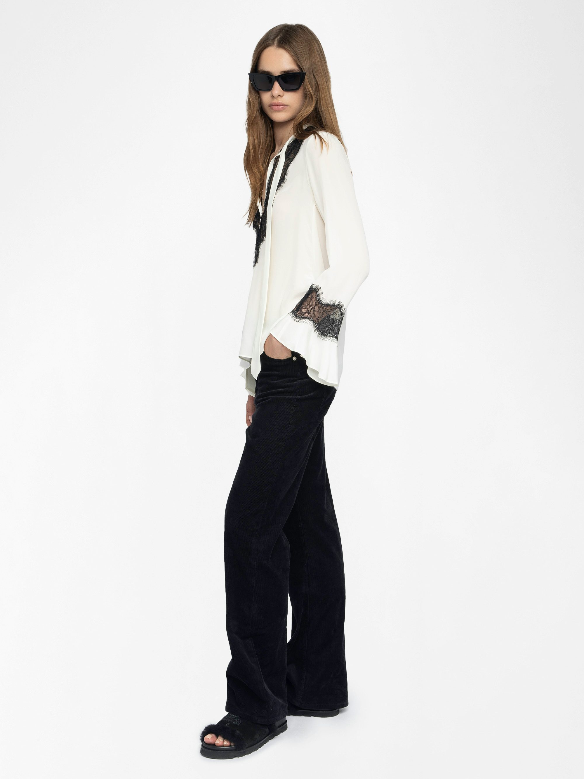 Tuan Lace Shirt - The Tuan shirt plays contrast with a soft ivory silk and bold black lace trim. Effortlessly sensual, it drapes with attitude—open neckline, flared cuffs, and just the right amount of rebellion.